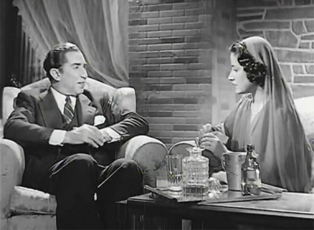 يوسف وهبى وأسمهان من فيلم غرام وانتقام